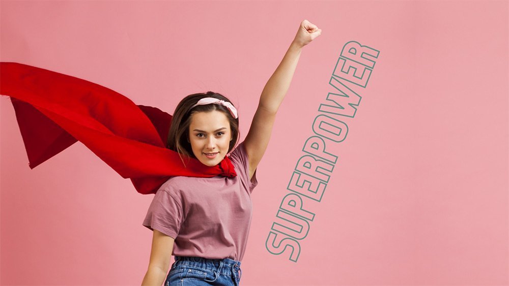 a girl with a red cape on her head.