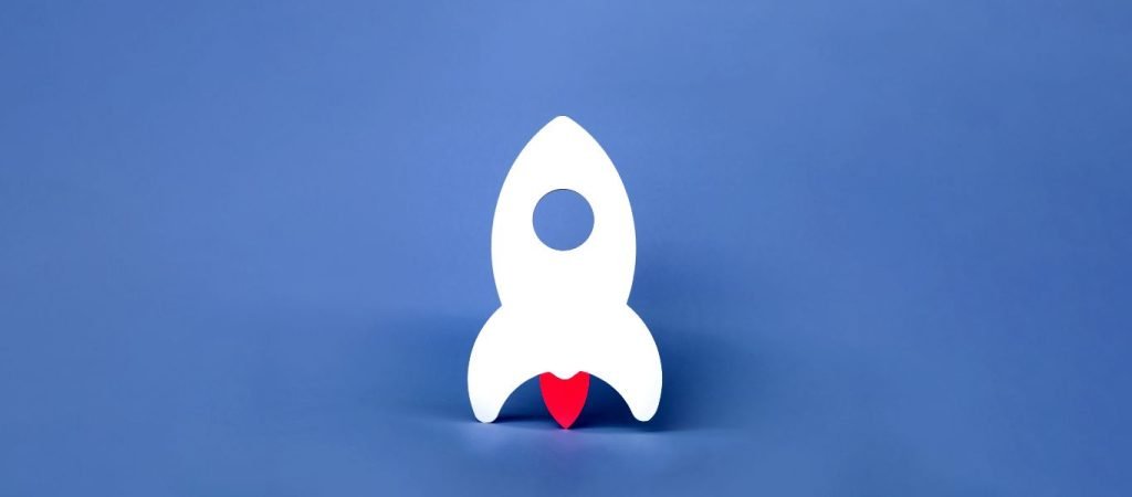 white rocket on blue background