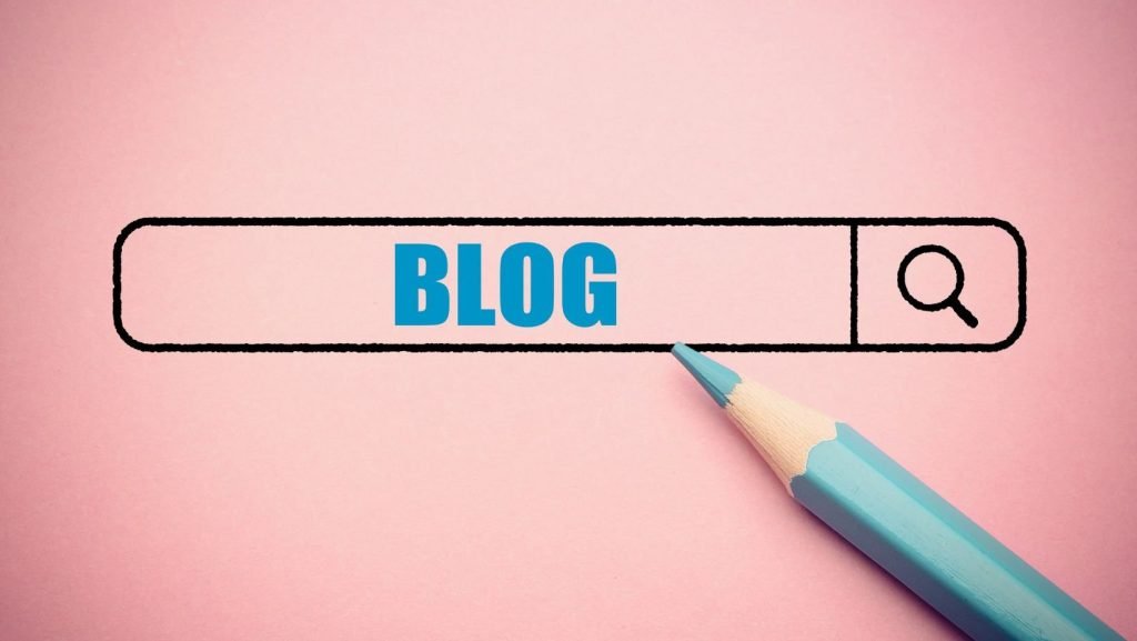 A pink surface with a pencil, relevant for Website's Blog.