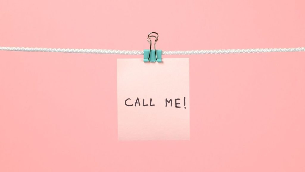 Call To Action: Call me written on note pegged to string